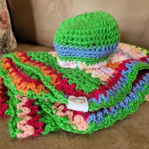 Beautiful Easter colours for an Easter Baby comes with a free hat.